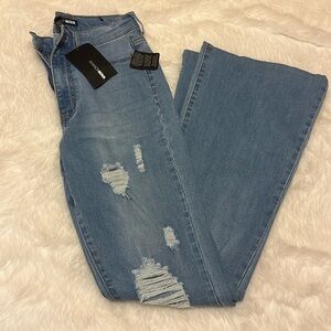 Fashion nova distressed flare jeans